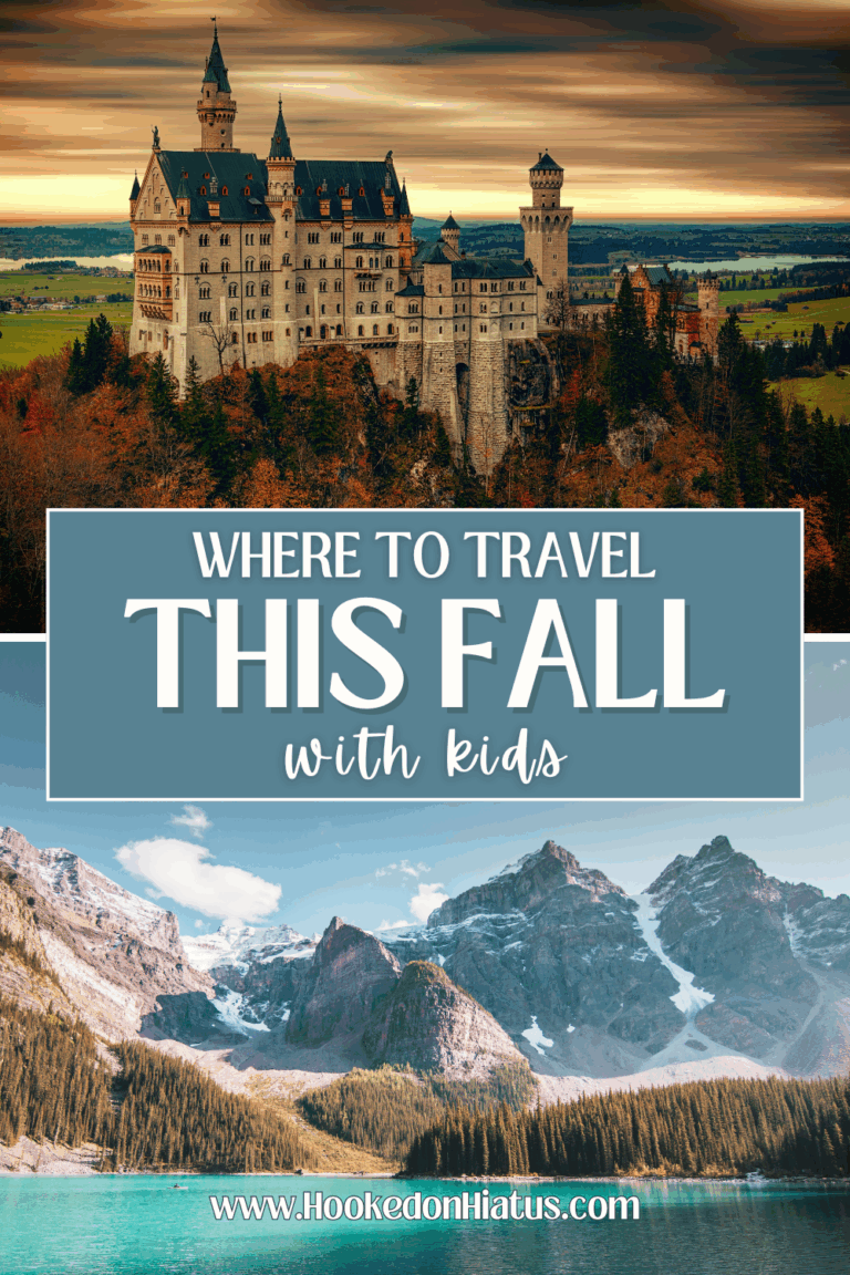 autumn foliage with castle and mountains over crystal clear lake