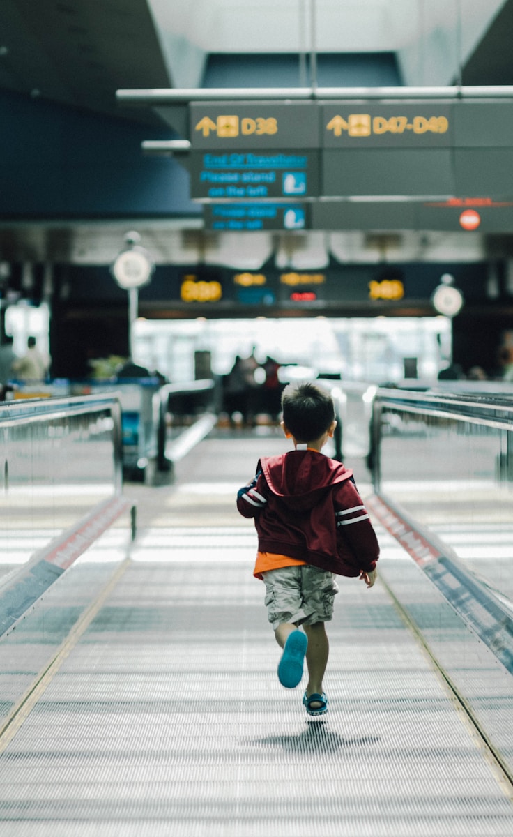 flying with toddler running in the airport