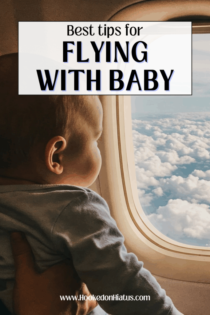 baby looking out plane window