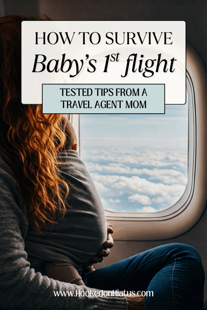mom wearing baby on plane