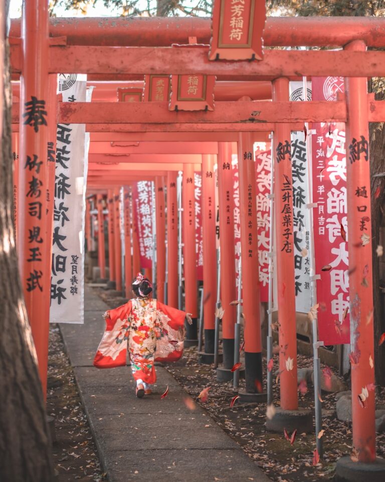 girl walking in kimono through shrine in Tokyo