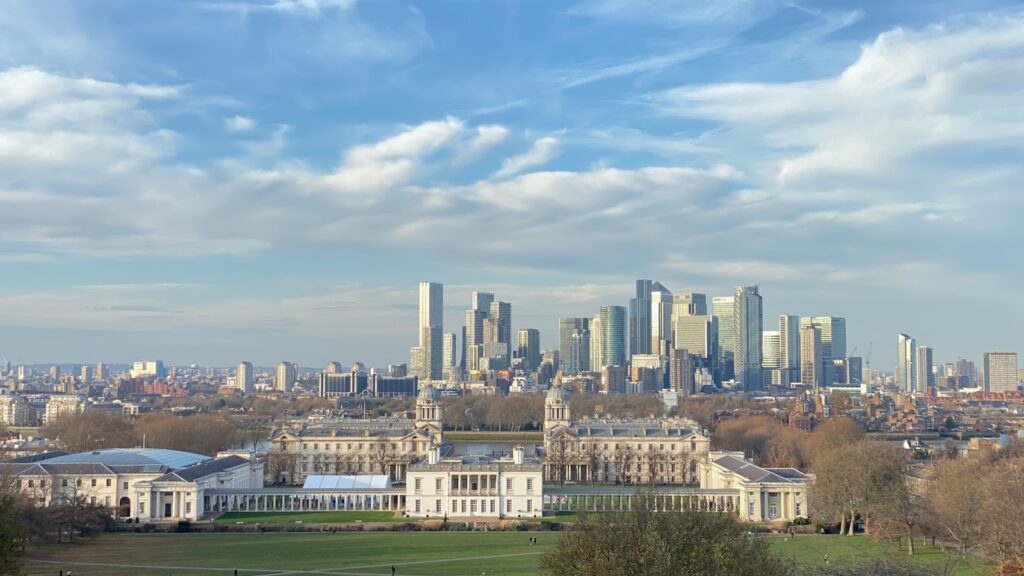 city buildings under blue sky during daytime