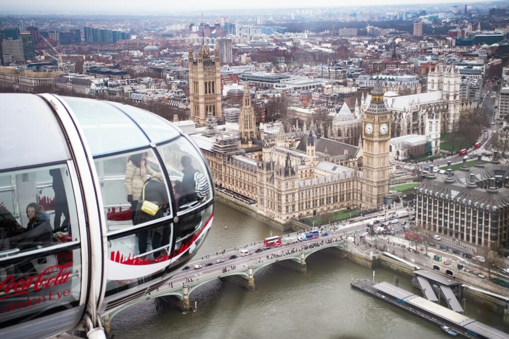 a cable car going over a bridge over a river