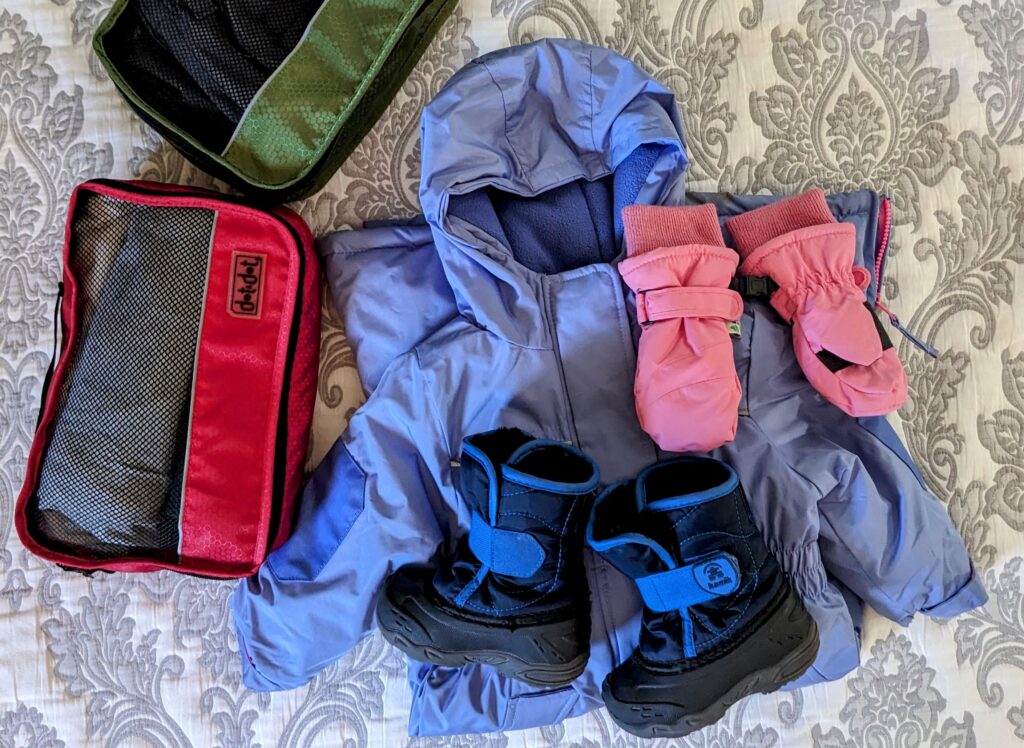 kids winter gear with packing cubes