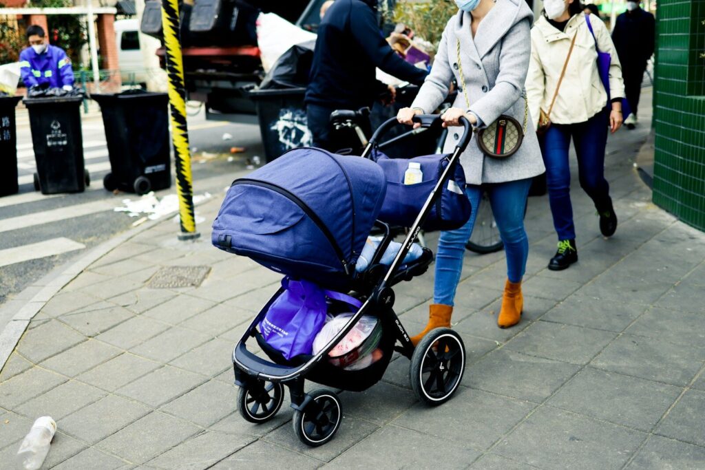 a person pushing a stroller